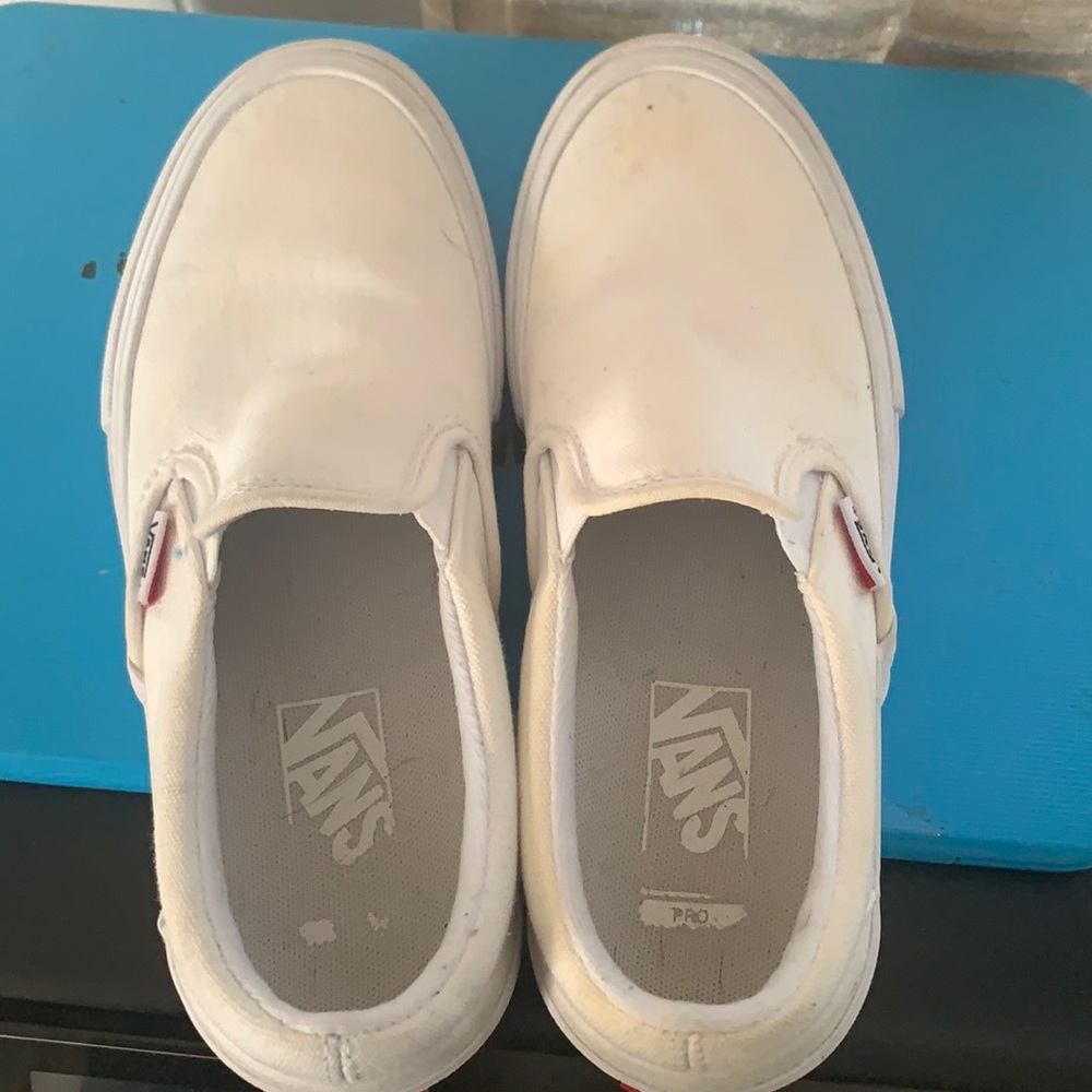 Used - all white slip on vans